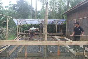 - Yiyi and Adin building the tree nursery