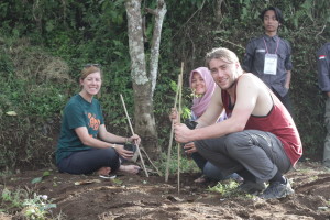 Katie, Wita and Sam competing in the tree planting event